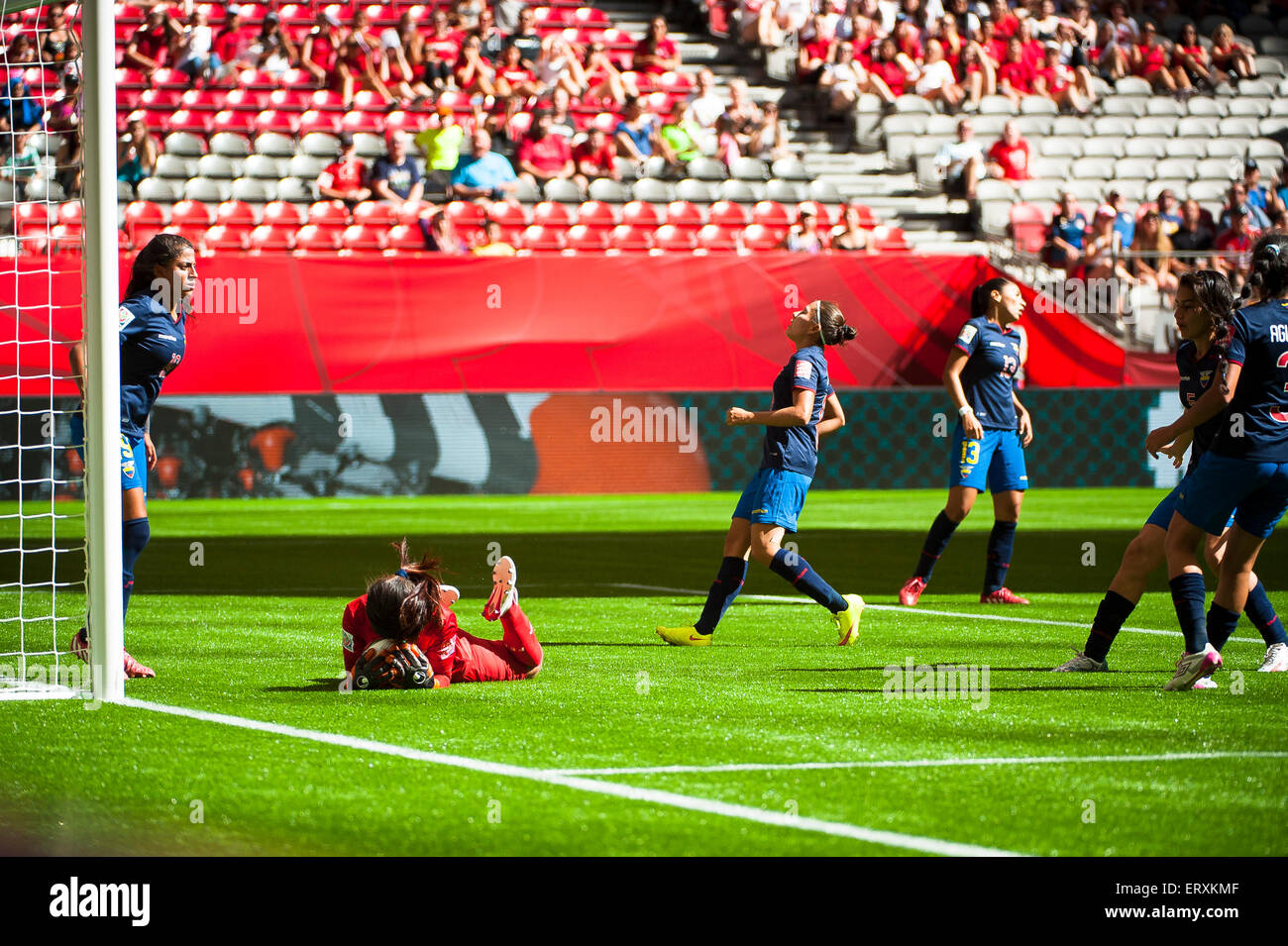 Vancouver, Canada. 8th June, 2015. Ecuador goalkeeper Shirley BERRUZ (#1) protects the ball during the opening round match between Cameroon and Ecuador of the FIFA Women's World Cup Canada 2015 at BC Place Stadium. Cameroon won the match 6-0. Credit:  Matt Jacques/Alamy Live News Stock Photo