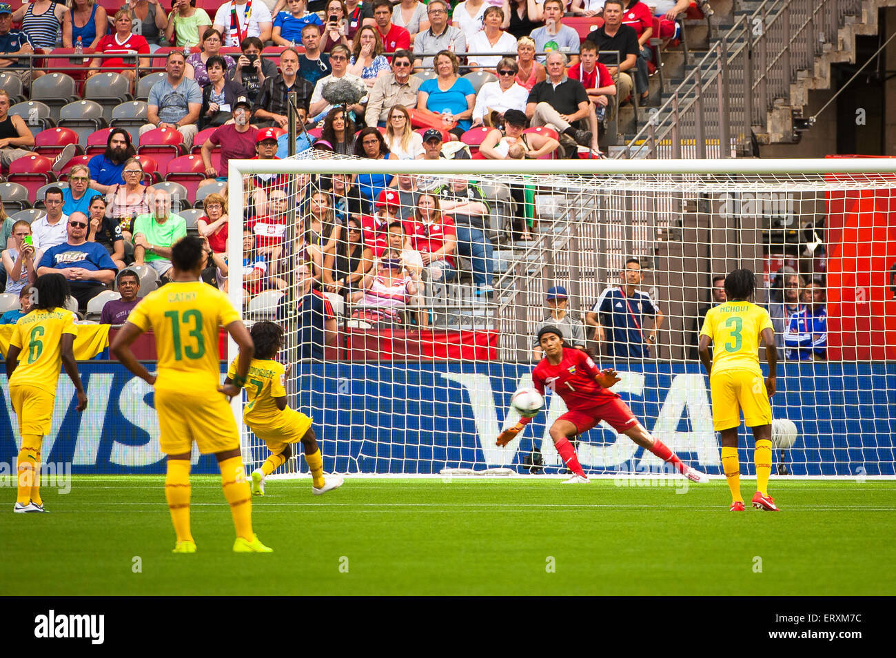 Vancouver, Canada. 8th June, 2015. Ecuador goalkeeper Shirley BERRUZ (#1) dives to protect the goal during the opening round match between Cameroon and Ecuador of the FIFA Women's World Cup Canada 2015 at BC Place Stadium. Cameroon won the match 6-0. Credit:  Matt Jacques/Alamy Live News Stock Photo