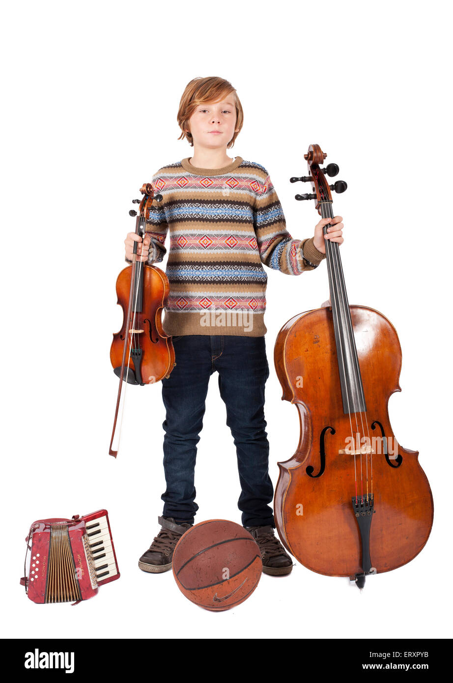 blond boy with violin, cello, accordion and basketball Stock Photo Alamy