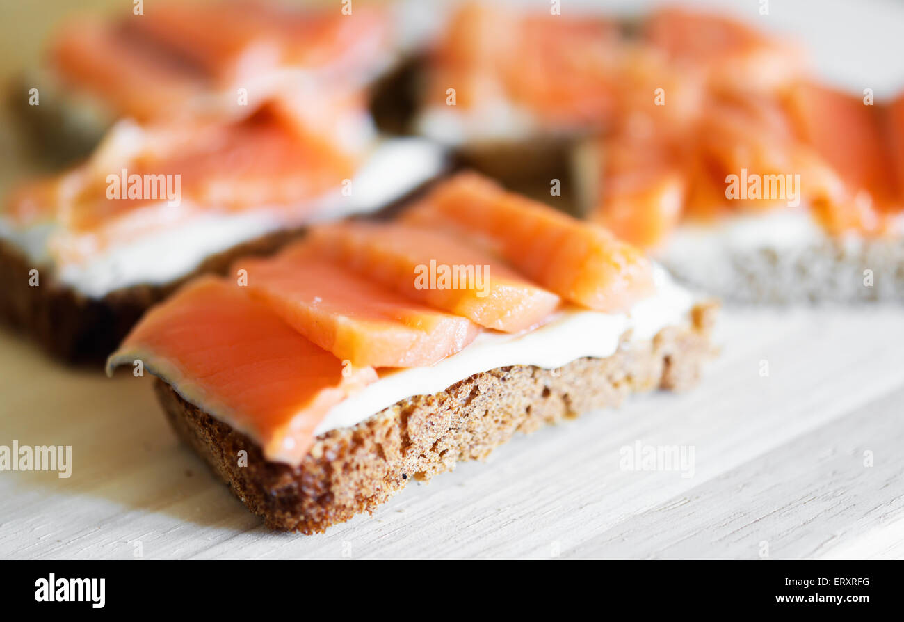 sandwiches with red fish and soft cheese Stock Photo
