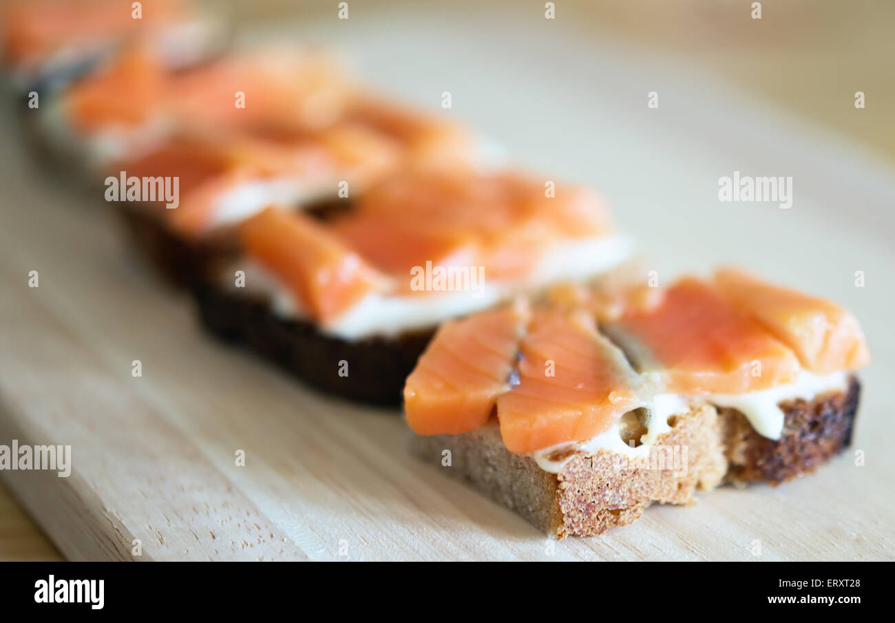 sandwiches with red fish and soft cheese Stock Photo