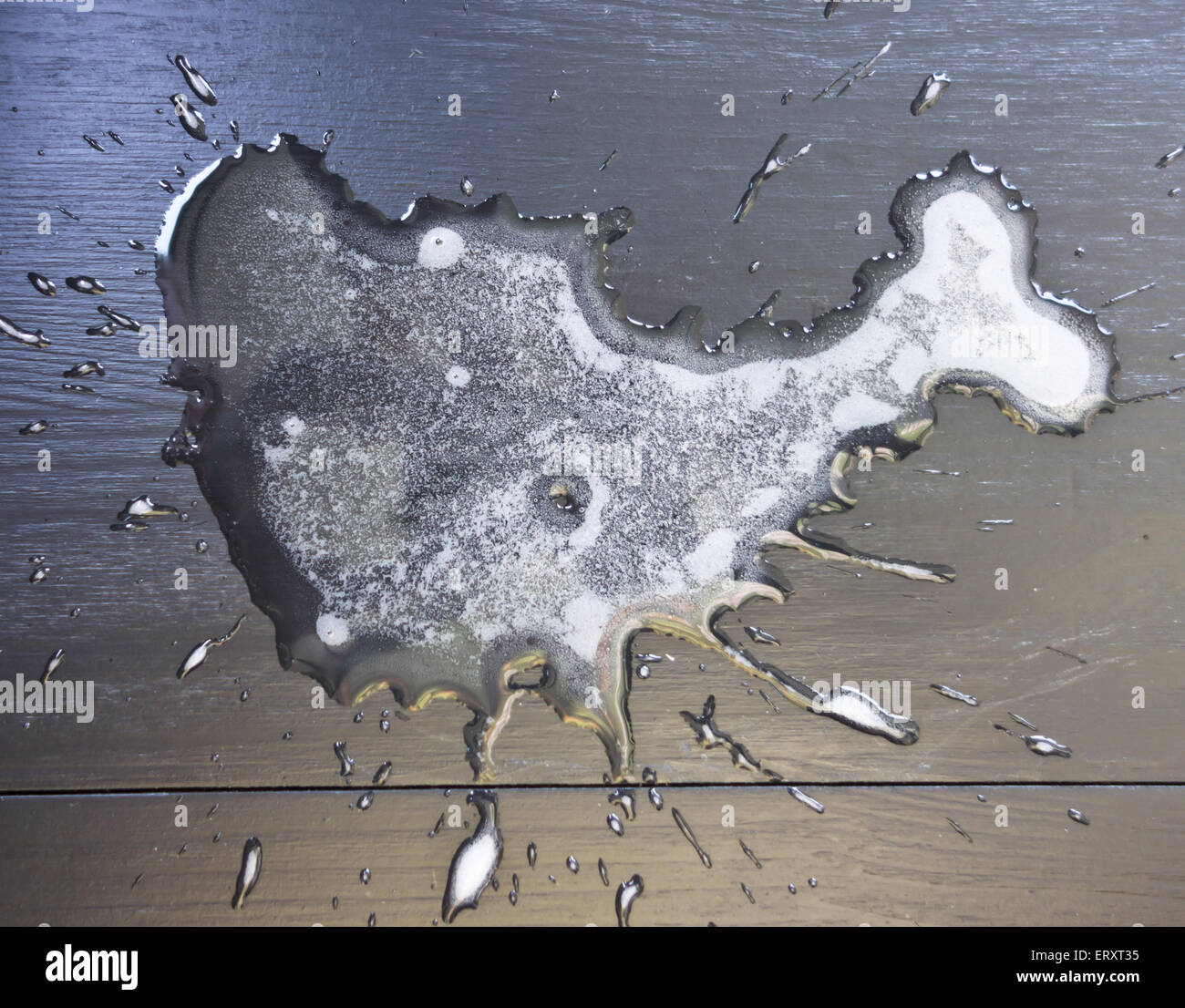 spilled liquid on the table Stock Photo - Alamy