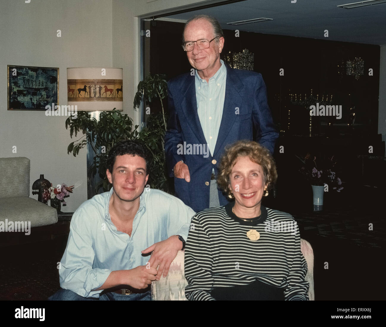 German-born Hans Stern, gemologist and founder of the worldwide H. Stern jewelry empire, stands for an informal portrait with his wife, Ruth, and the eldest of four sons, Roberto, in 1989 in their home in Rio de Janeiro, Brazil, South America. Stock Photo