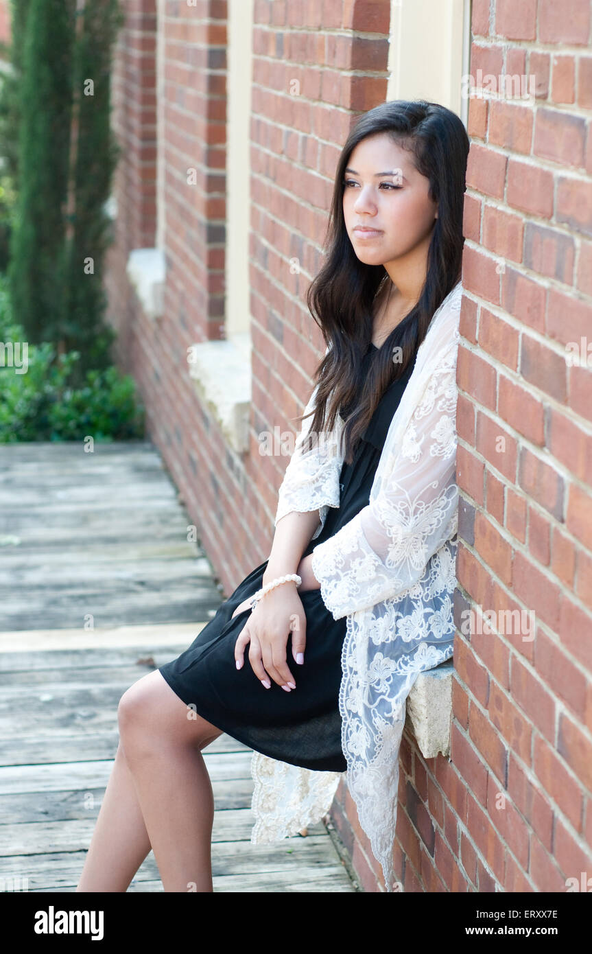 Attractive Young Model Wearing White Shirt with Lacy Black Lacy