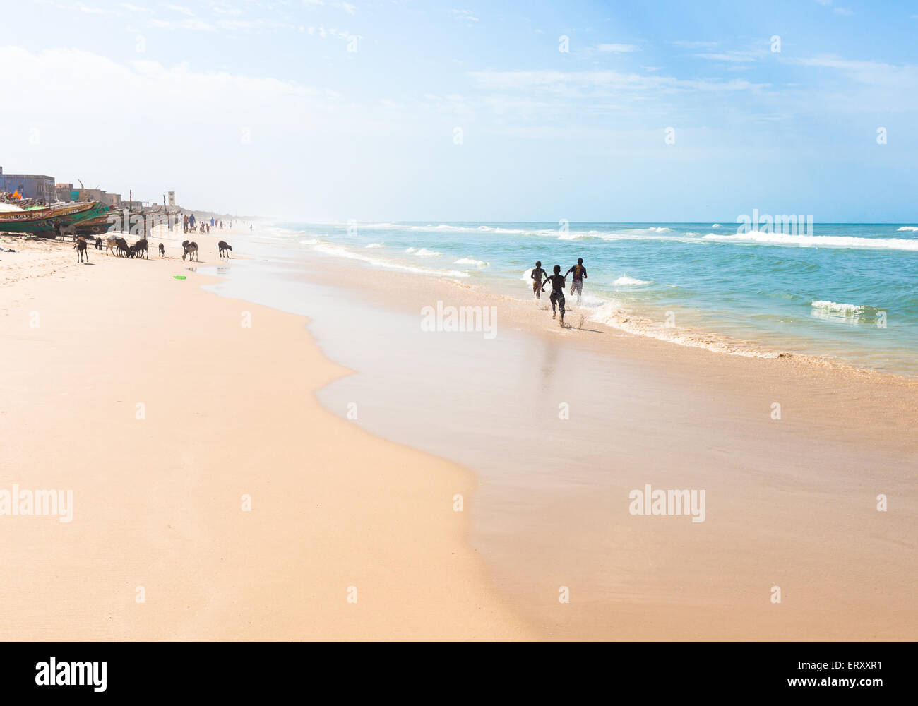 MBour Senegal November 2012,Boys running in the sand, Stock Photo