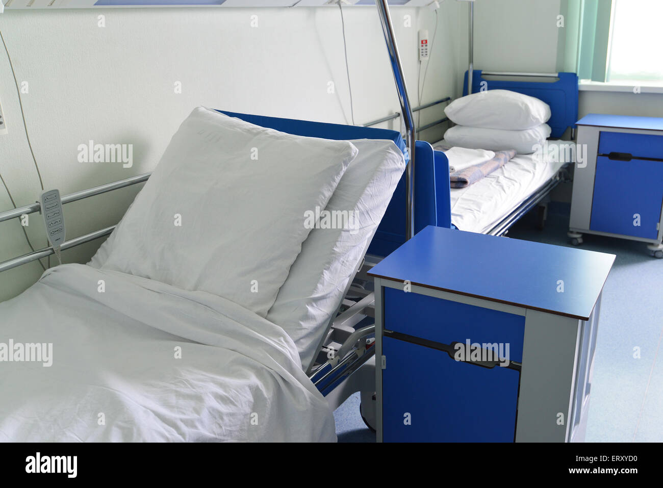 Hospital beds in a private hospital ward Stock Photo Alamy