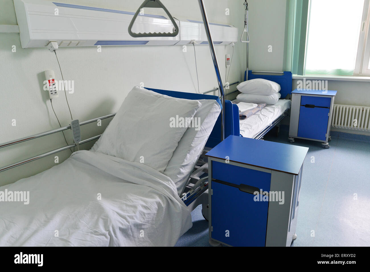 Hospital beds in a private hospital ward Stock Photo Alamy