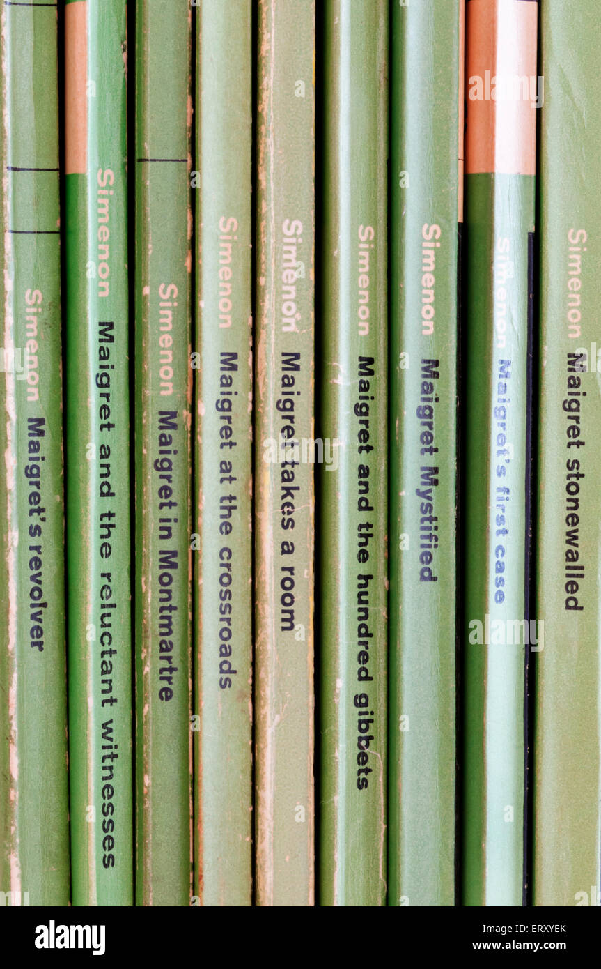 A row of Inspector Maigret novels by Simenon, published as green Penguin crime novels in the 1960s. Stock Photo