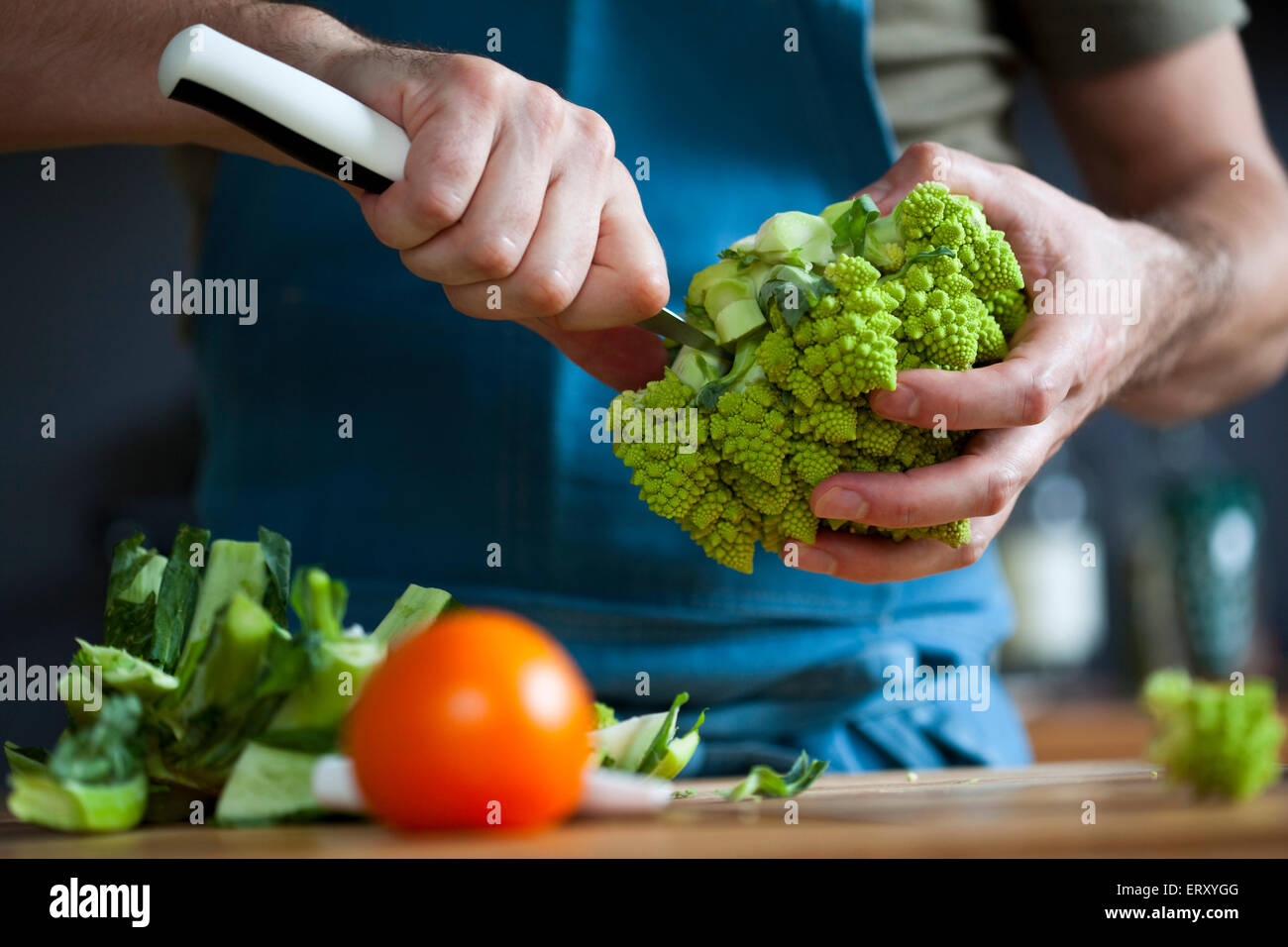 Chef cutting vegetable in a kitchen before cooking Stock Photo Alamy