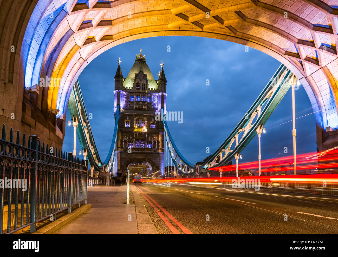 Bridge Tower night view from the bridge, London United Kingdom. A combined bascule and suspension bridge which crosses the River Stock Photo