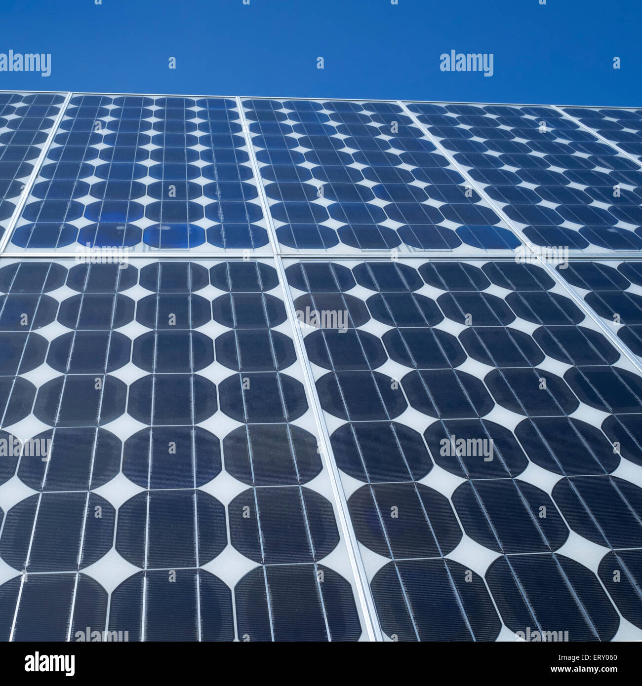 Solar panel photovoltaic cells array close up blue sky copy space Renewable energy clean eco-friendly power source Stock Photo