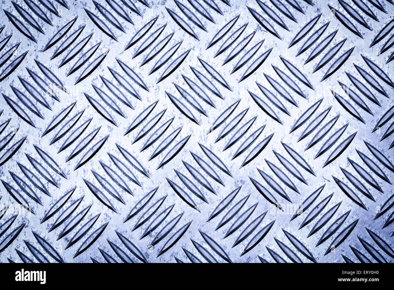 Blue colored diamond plate, checker plate,  tread plate, cross hatch kick plate and Durbar floor plate for texture background. Stock Photo