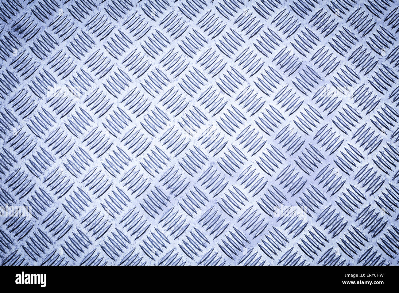 Blue colored diamond plate, checker plate, tread plate, cross hatch kick plate and Durbar floor plate for texture background. Stock Photo