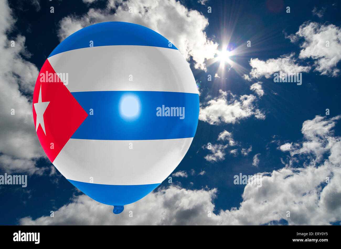 balloon in colors of cuba flag flying on blue sky Stock Photo Alamy