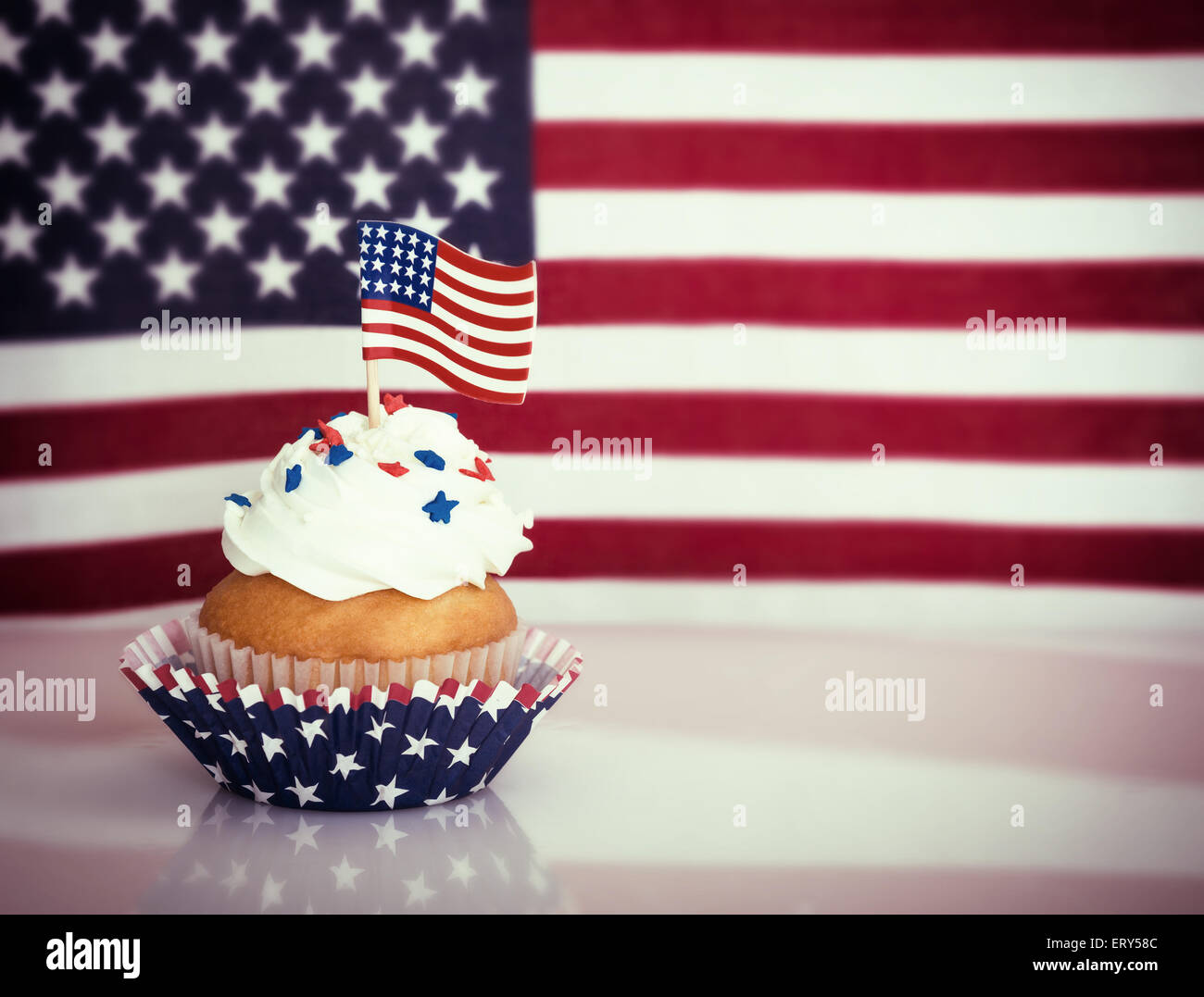Patriotic 4th of July cupcake with American flag Stock Photo