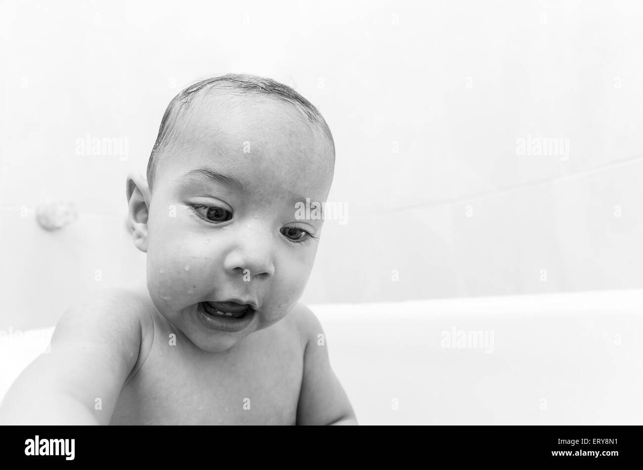 Cute baby boy in the bathtub Stock Photo - Alamy