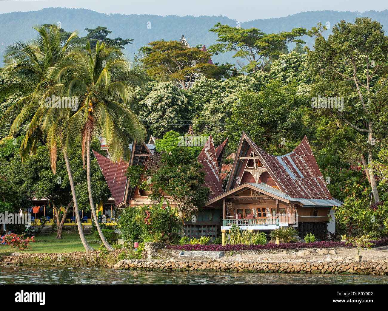 Batak house on the Samosir island near lake Toba, Indonesia, North Sumatra, Stock Photo