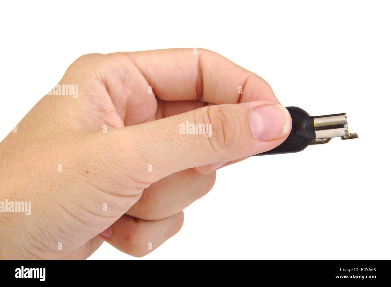 Hand holding a security key isolated on white background Stock Photo