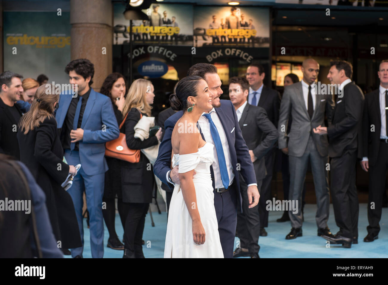 London, UK. 09th June, 2015. Kevin Dillon joins Emmanuelle Chriqui on the blue carpet for press shots against a backdrop of co-stars at the London premiere of the Entourage movie in Leicester square. Credit:  Peter Manning/Alamy Live News Stock Photo