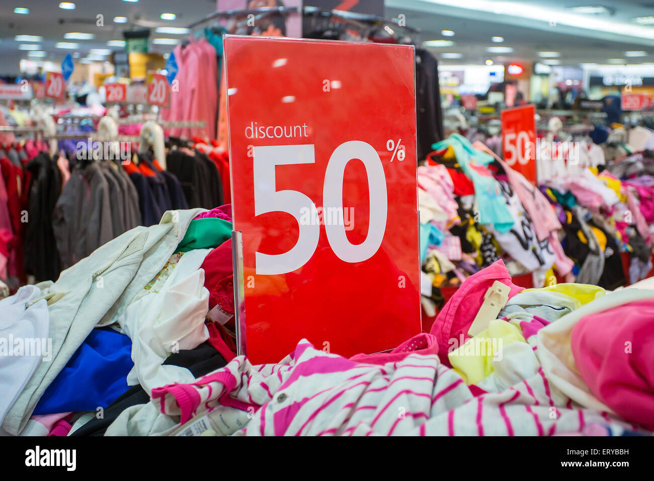 Sale sign in the clothing shop Stock Photo
