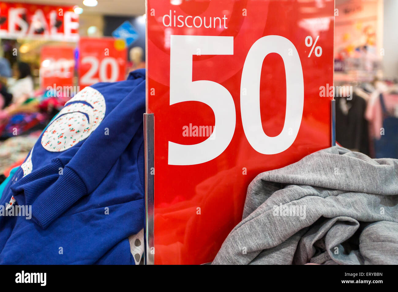Sale sign in the clothing shop Stock Photo