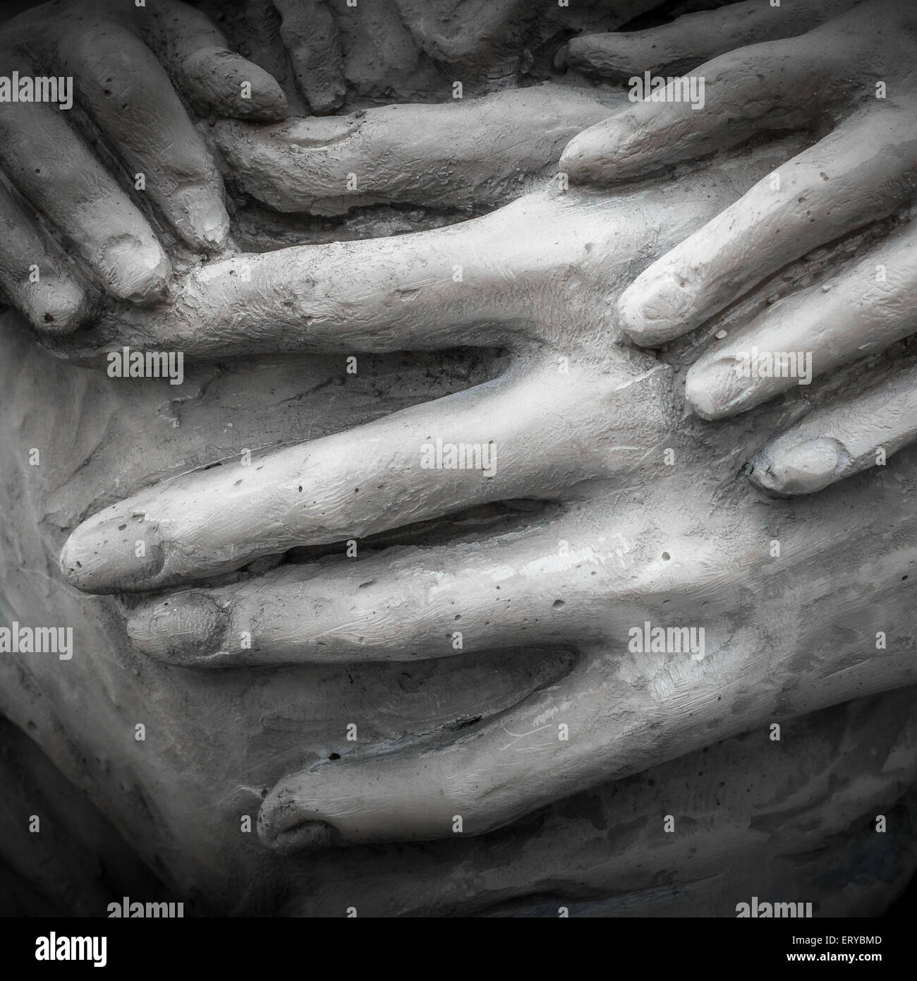 Detail of a marble statue with hands of child and woman together Stock ...