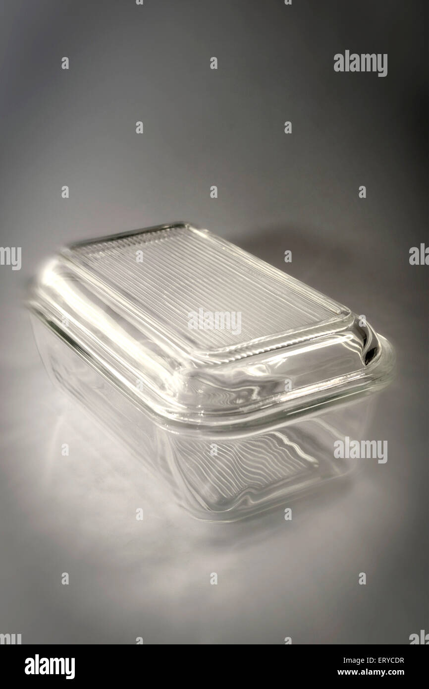 empty glass butter box on gray background Stock Photo