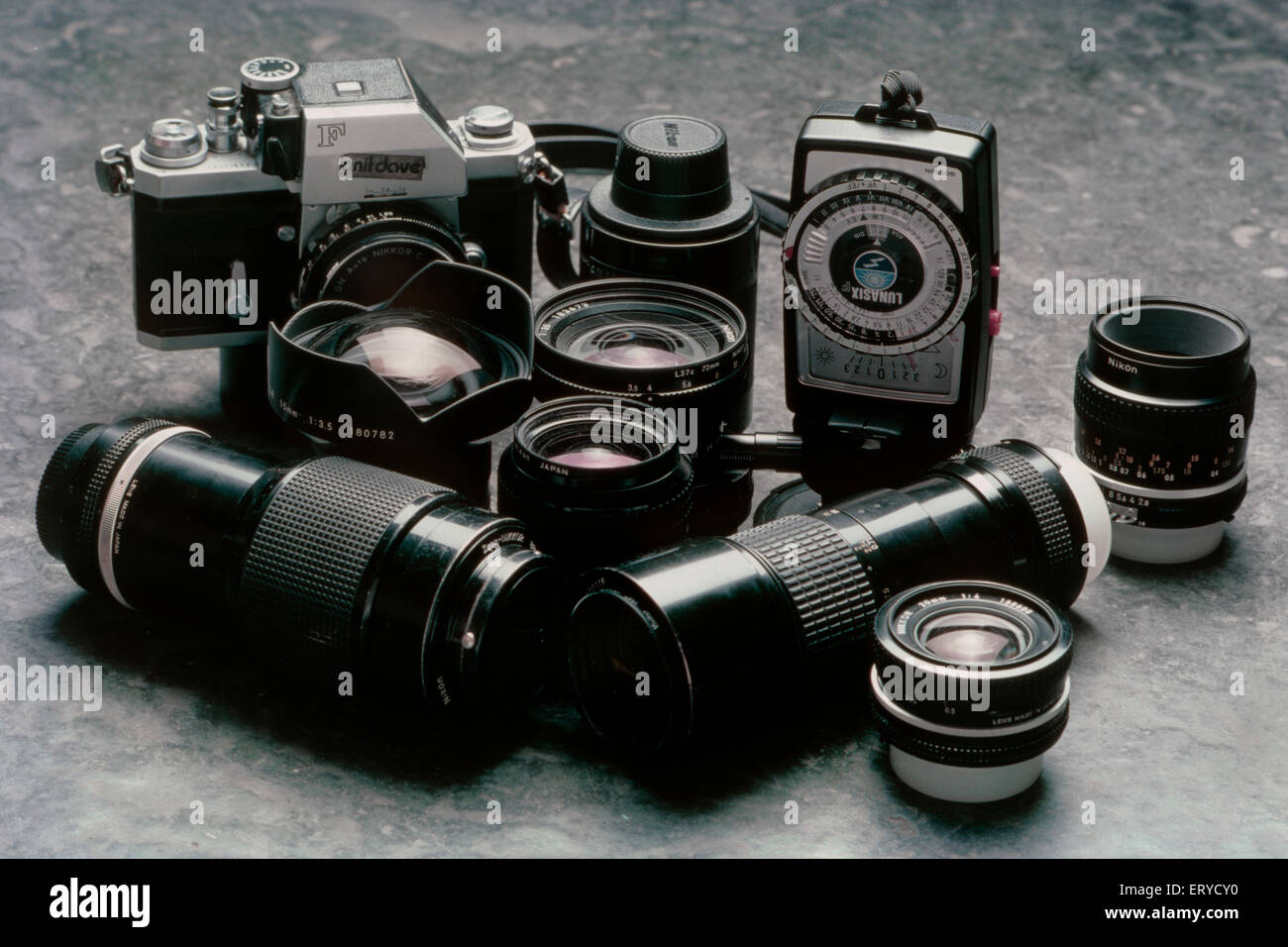 Old Nikon F Camera and lenses wide tele exposure meter on black background  Stock Photo - Alamy