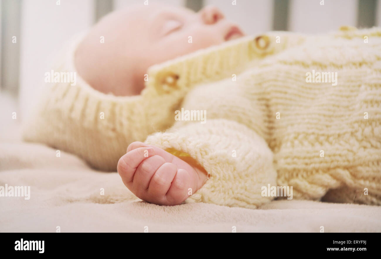 Sleeping cute newborn baby maternity concept soft image of beautiful family