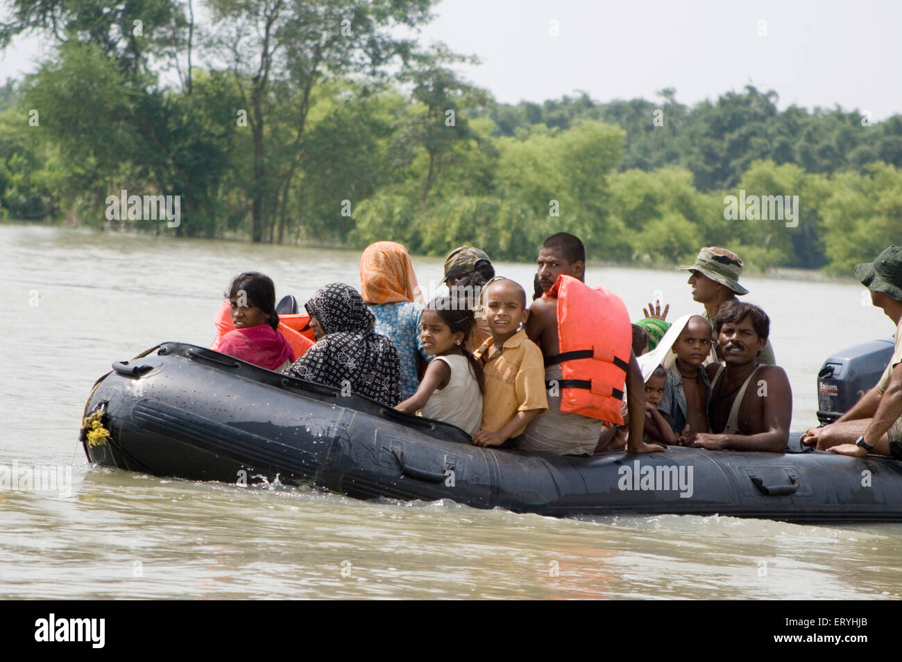 BSF force undertaking rescue operation ; Kosi river flood in year 2008 ; Purniya district ; Bihar ; India Stock Photo