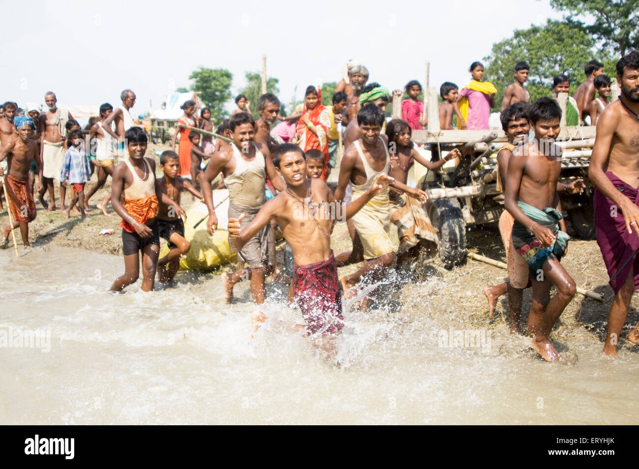 Supply of food package ; Kosi river flood in year 2008 which mostly made suffered below poverty line people in Purniya ; Bihar Stock Photo