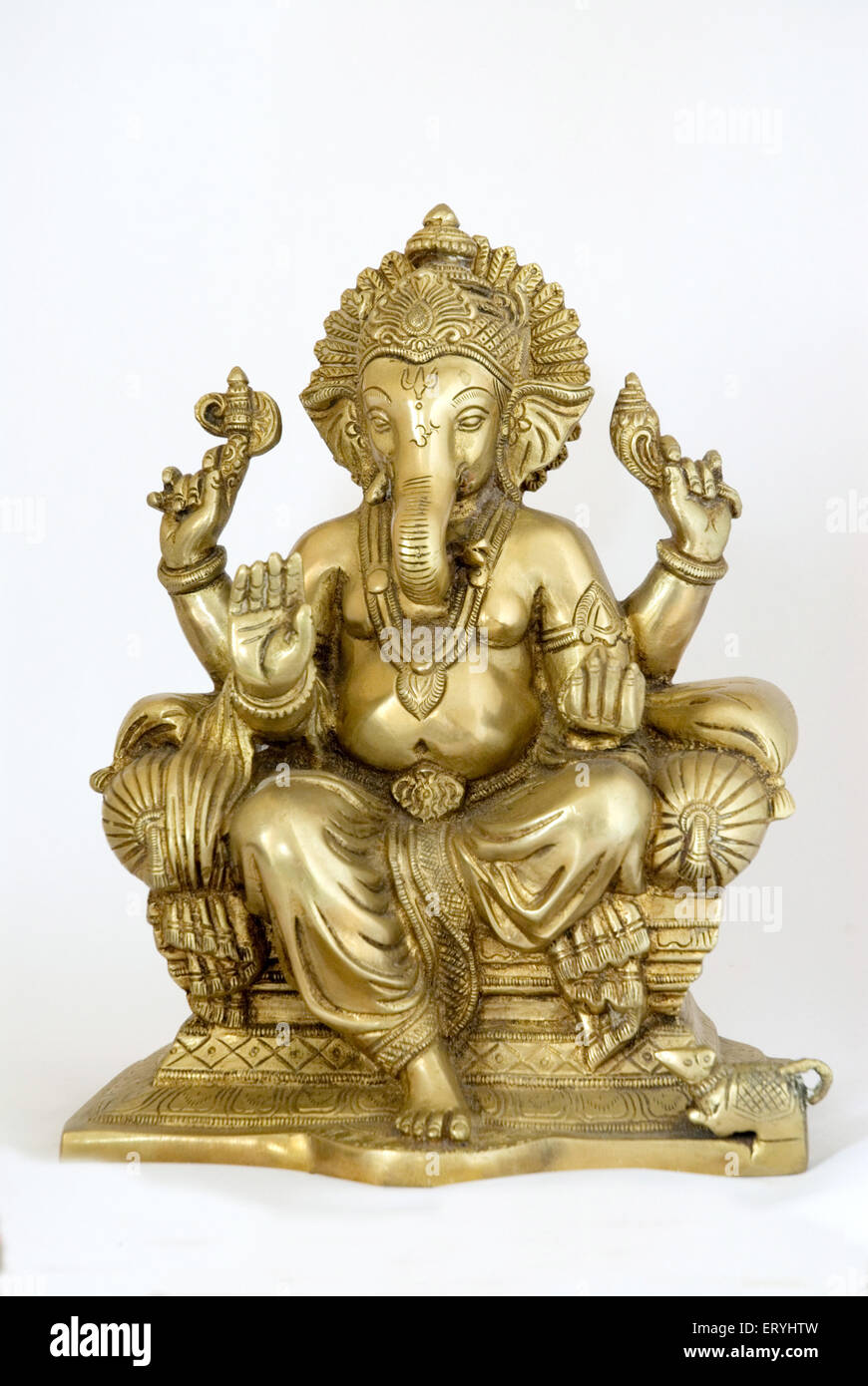 Brass statue of lord Ganesha elephant headed god ; India Stock Photo