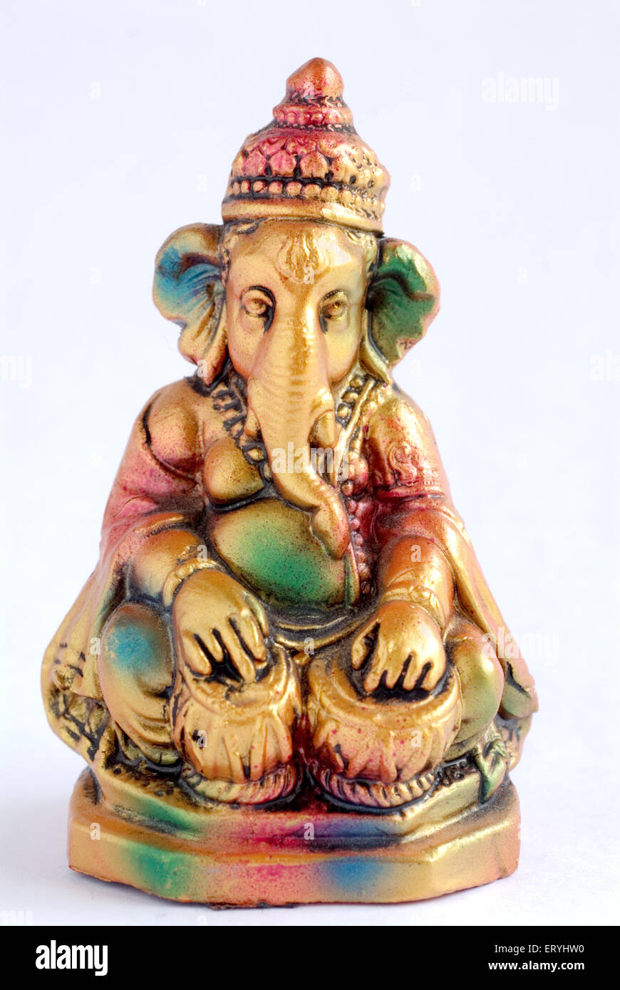 Colourful statue of lord Ganesha elephant headed god playing tabla ; India Stock Photo