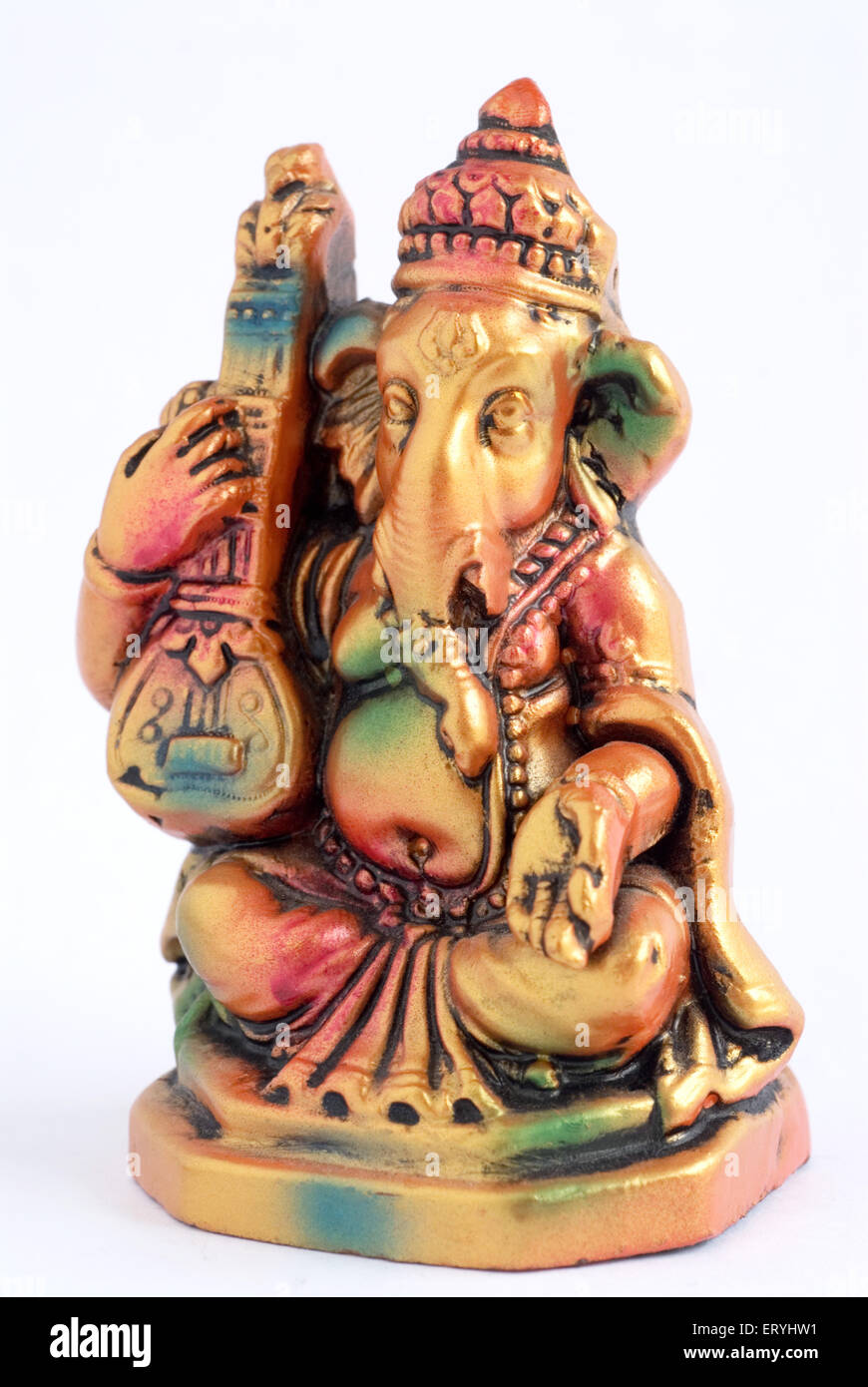 Colourful statue of lord Ganesha elephant headed god playing tambora ...