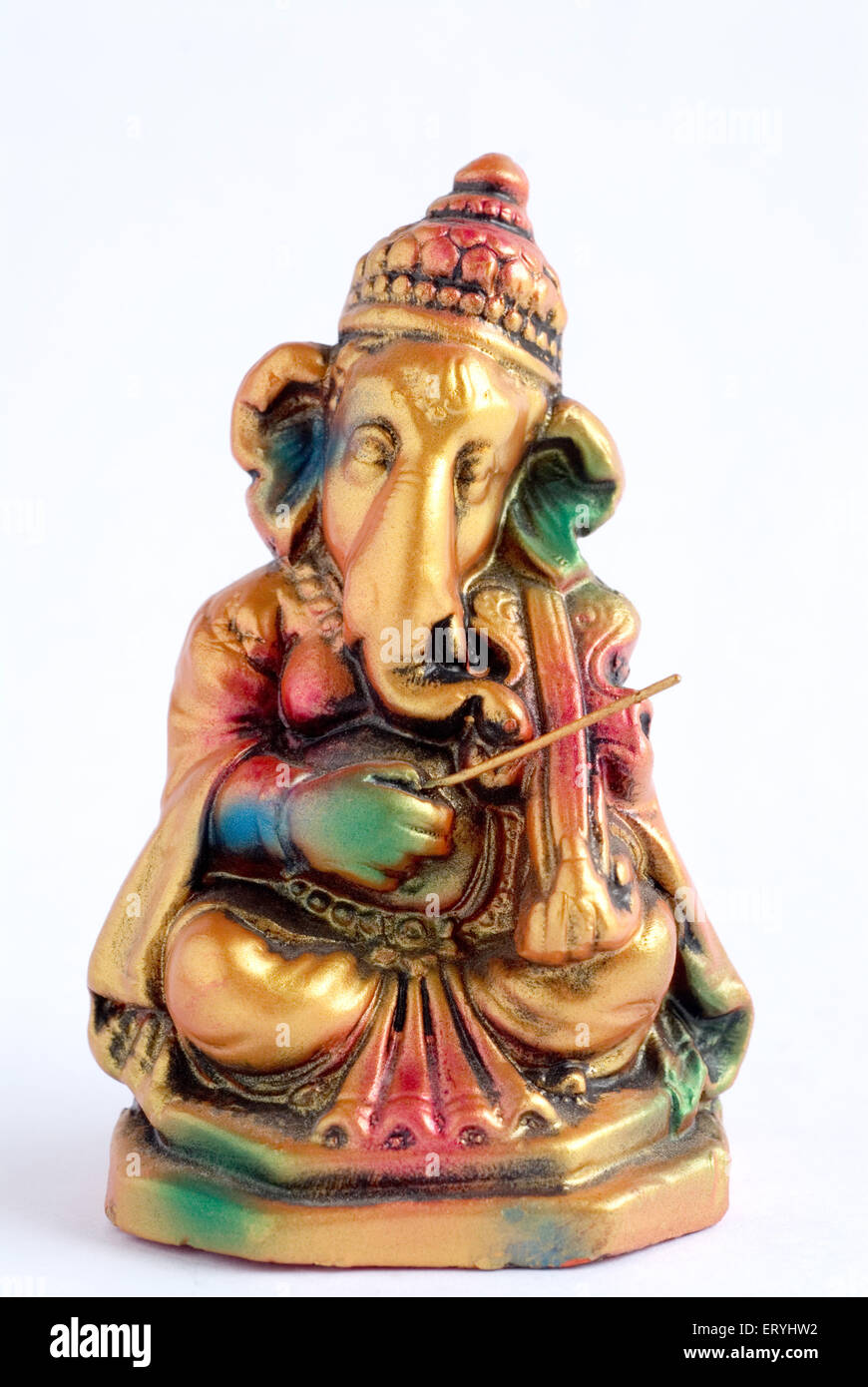 Colourful statue of lord Ganesha elephant headed god playing violin ; India Stock Photo