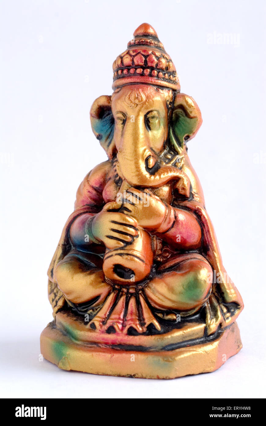 Colourful statue of lord Ganesha elephant headed god playing tutari Trumpet; India Stock Photo