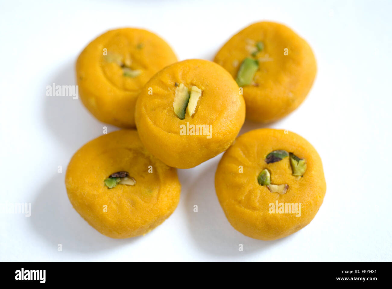 kesar mawa peda garnish with pistachio , saffron khoya peda , khoa pera , Stock Photo