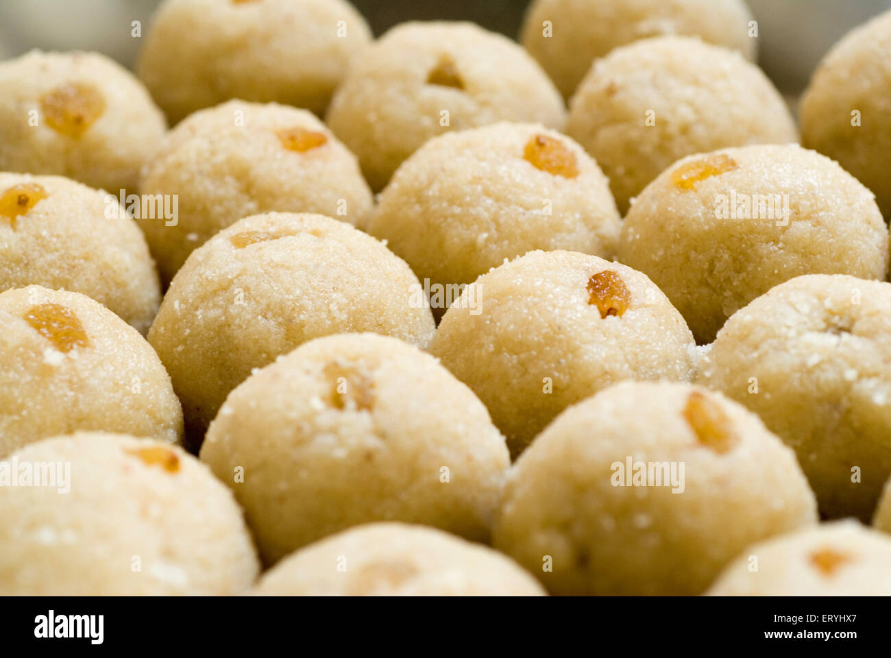 rava semolina sweet ladoo laddu with resins , Stock Photo