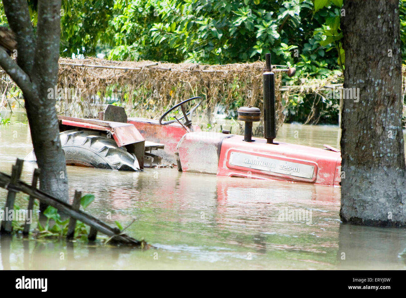 Mahindra tractor submerged , Kosi river flood , Koshi , Purnea , Purnia district , Bihar , India , Asia Stock Photo