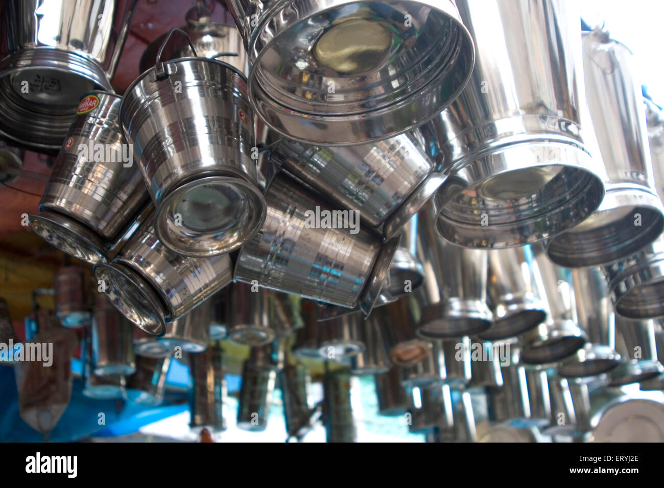 Steel buckets for sale display in shop , India , Asia Stock Photo