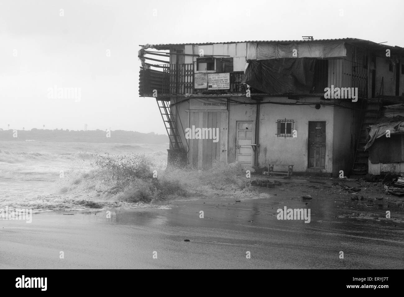 Slum on sea front at Versova beach ; Bombay Mumbai ; Maharashtra ; India Stock Photo