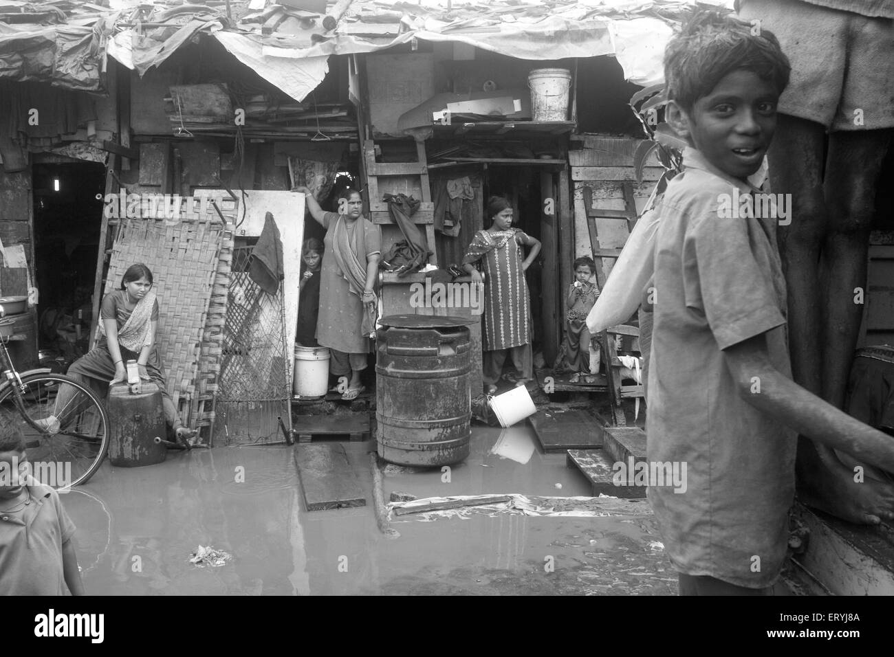 Women in front of their slum ; Ray road ; Bombay Mumbai ; Maharashtra ; India NO MR Stock Photo