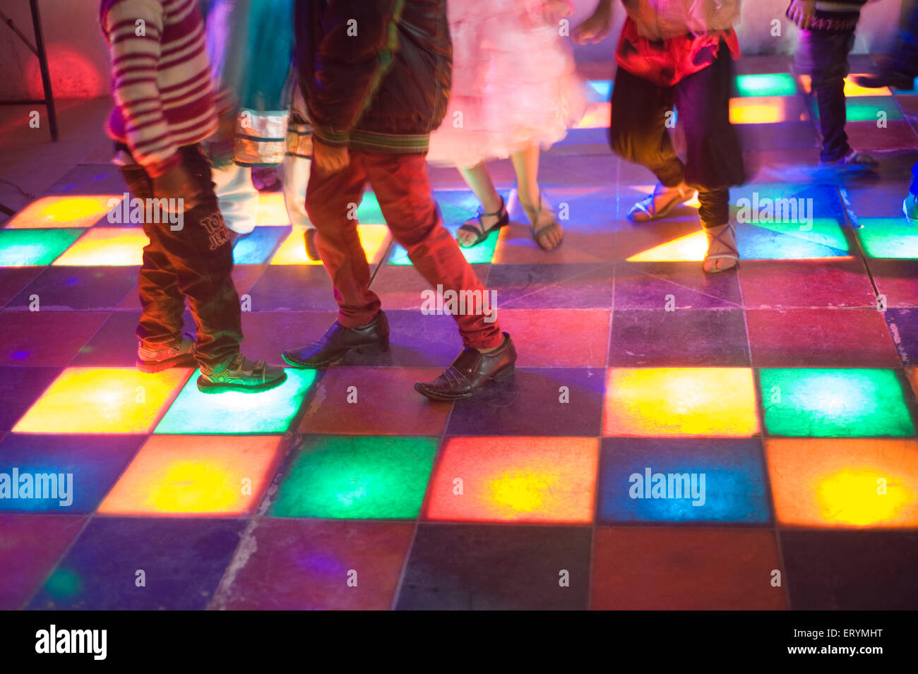 kids on disco dance floor India Asia Stock Photo