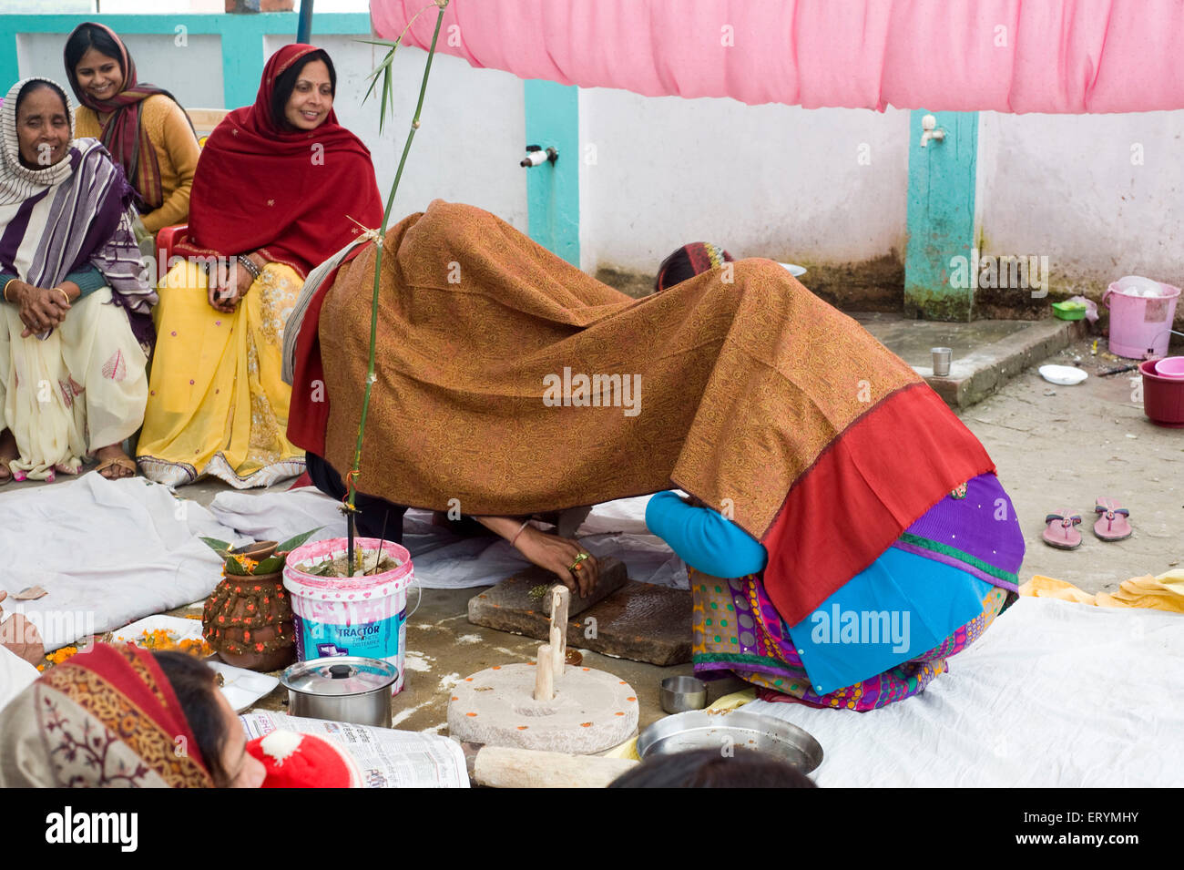 Couple performing rituals in wedding Jaunpur Uttar Pradesh India Asia Stock Photo