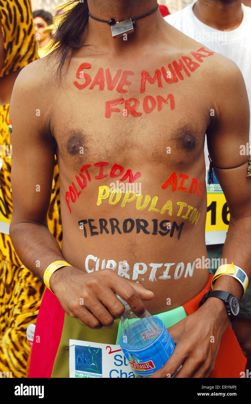 Man with messages on his body international marathon 2005 in ; Bombay ; Mumbai ; Maharashtra ; India Stock Photo