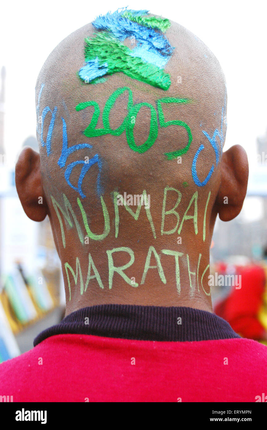 Man with messages on his body international marathon 2005 in ; Bombay ; Mumbai ; Maharashtra ; India Stock Photo