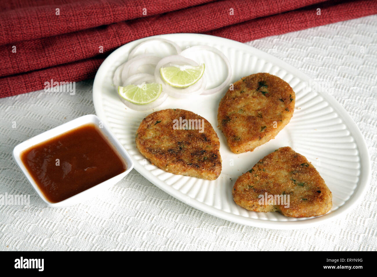 Cutlet with Onion Rings and Sauce India PR#743AH Stock Photo