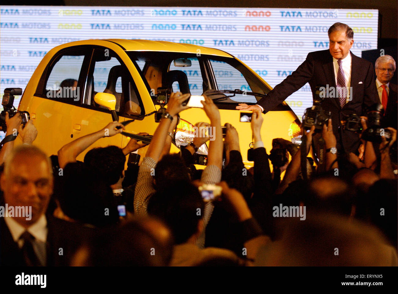 Ratan Tata Chairman , Nano car launch , Tata Motor , Tata Nano , smallest cheapest affordable hatchback car , Bombay , Mumbai , Maharashtra , India Stock Photo