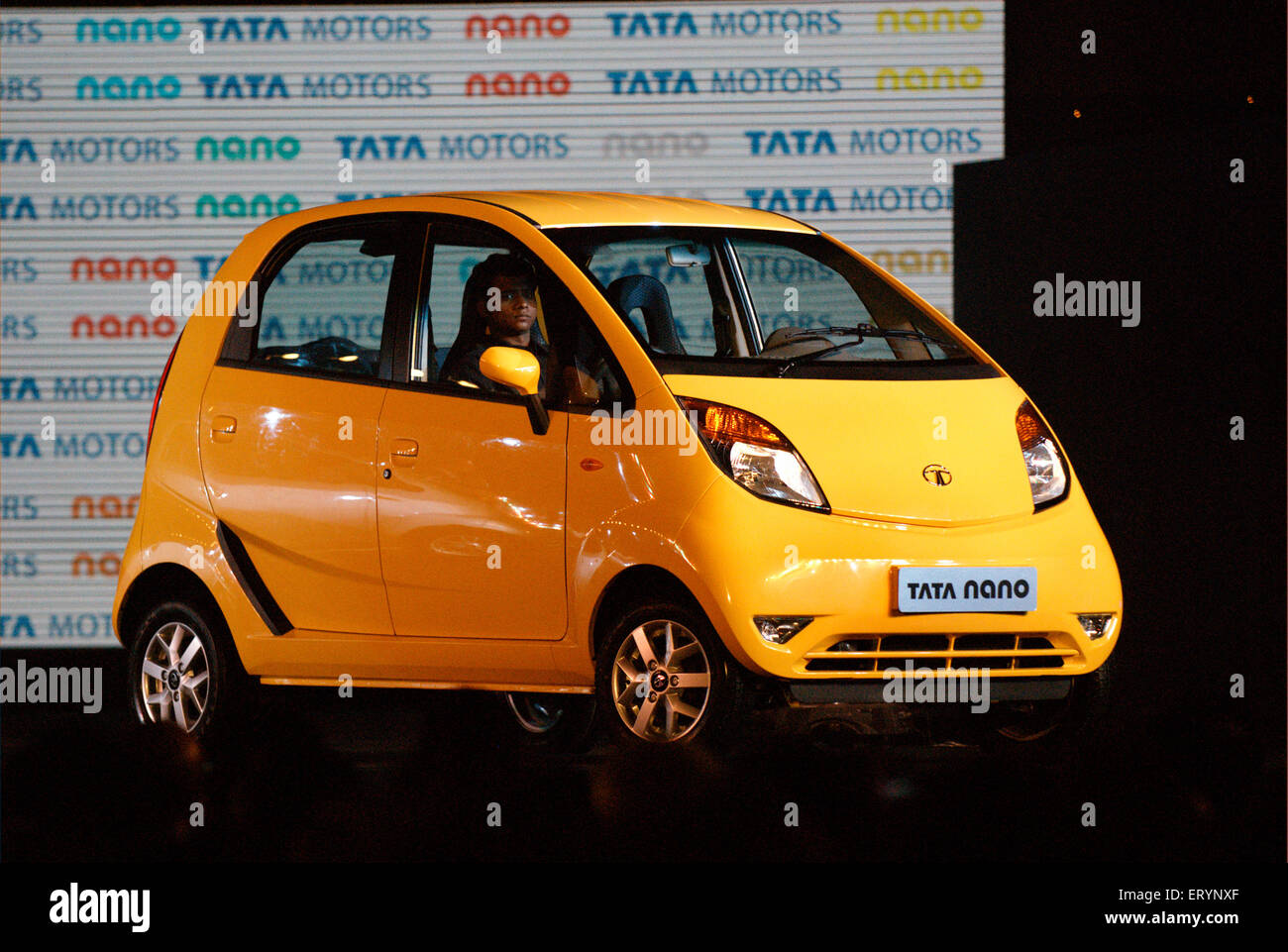 Tata Motor , Tata Nano , smallest cheapest affordable hatchback car , display at launch , Bombay , Mumbai , Maharashtra , India , Asia Stock Photo