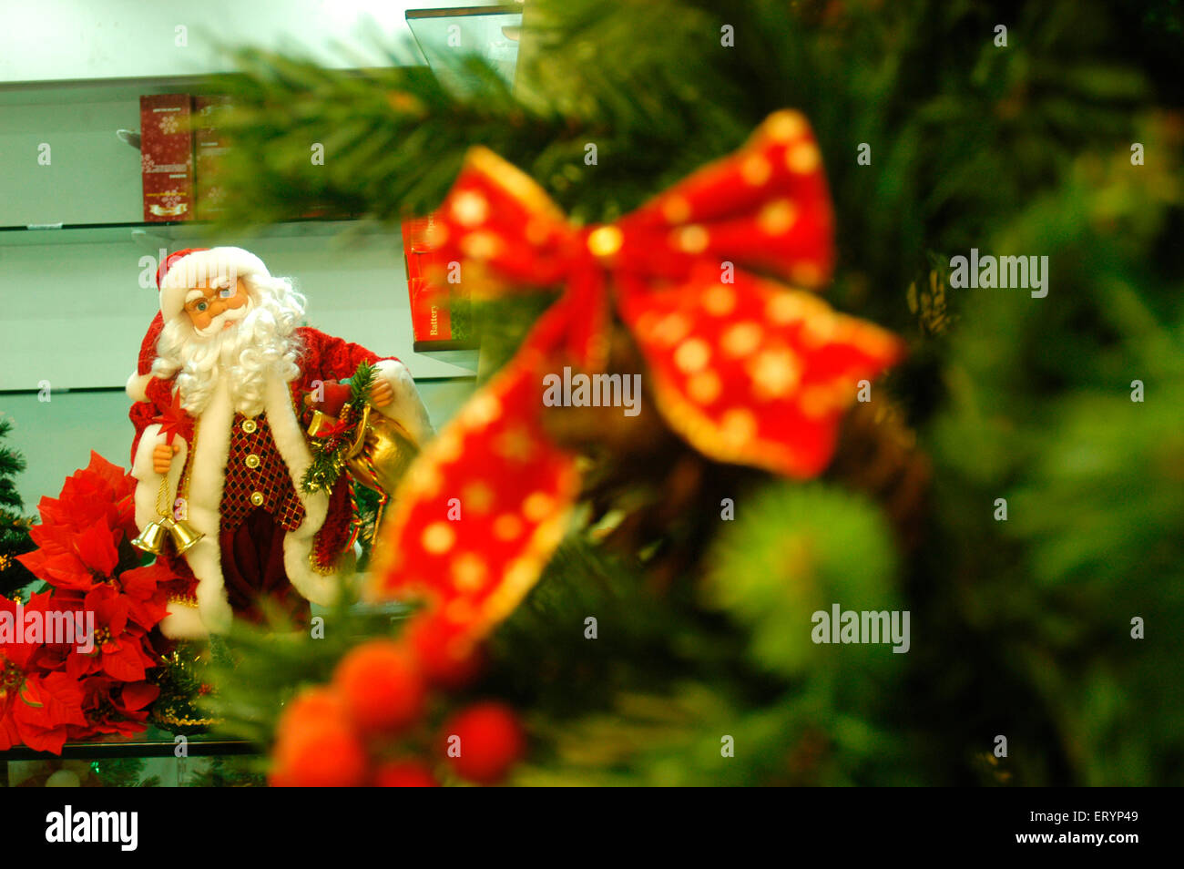 Artificial decorated Christmas trees for sale at Bandra in Bombay Mumbai ; Maharashtra ; India Stock Photo
